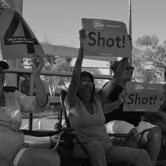 Supporters cheer on their teams.