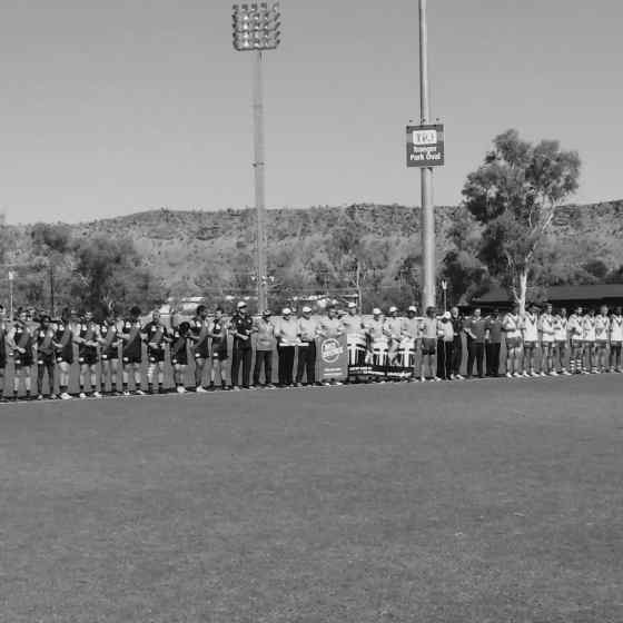 AFLCA Premier League Grand Final teams West Football Club and Federal Football Club link up at Traeger Park in Alice Springs.