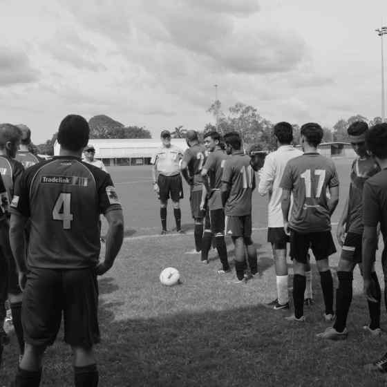 Teams ready and waiting to start the game.