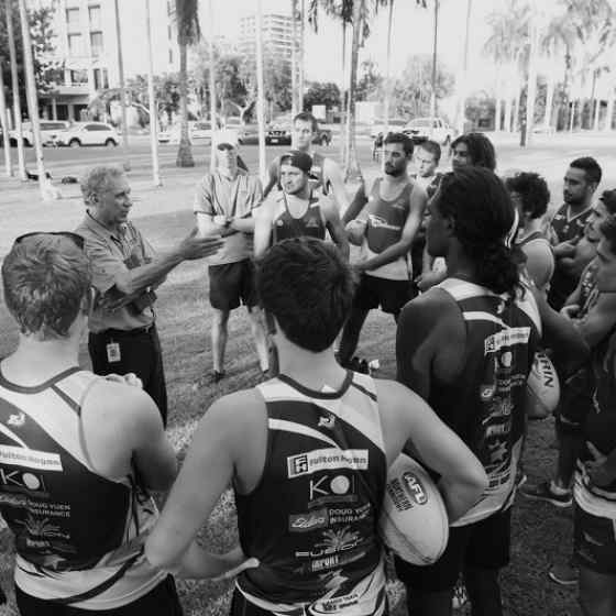 Charlie explaining No More and Dvaps to NTFL premiers Wanderers