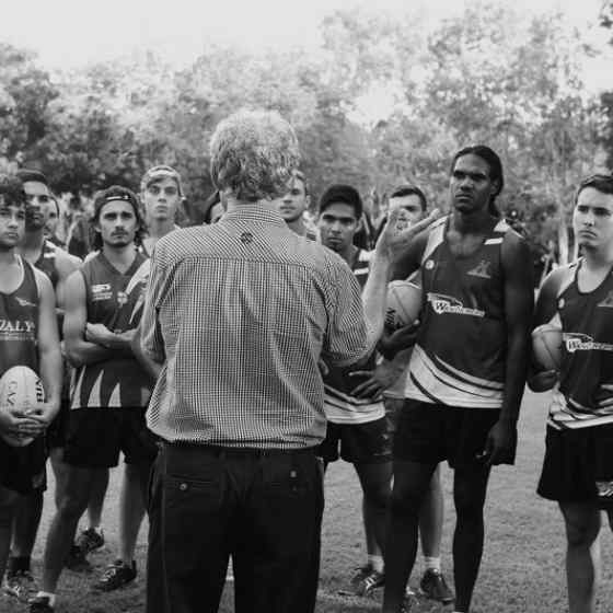 Charlie explaining No More and Dvaps to NTFL premiers Wanderers