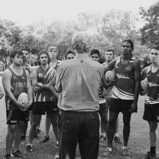 Charlie explaining No More and Dvaps to NTFL premiers Wanderers