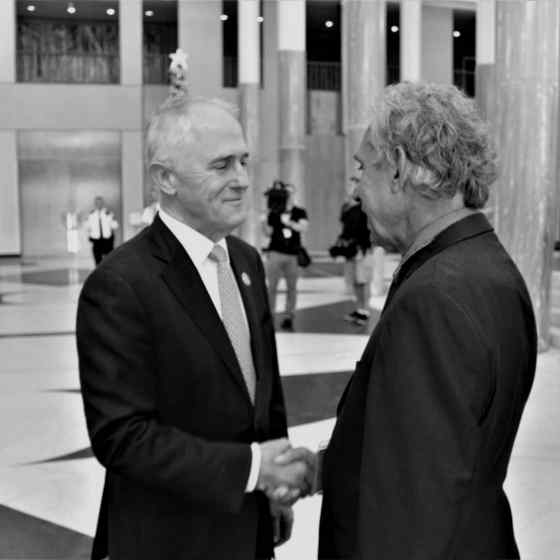 Charlie is greeted by Prime Minister Malcolm Turnbull.