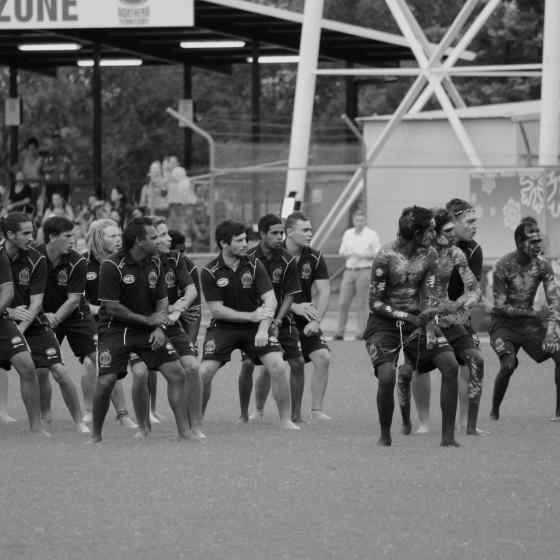 Rio Tinto Footy Means Business Indigenous team showing the crowd their war dance before the NTFL Grand Final match. 