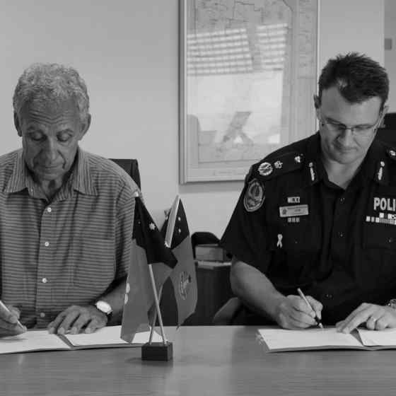 NO MORE Campaign Founder Charlie King and NT Police Force Commissioner Reece Kershaw sign an MoU to formalise the existing partnership between the two organisations. 