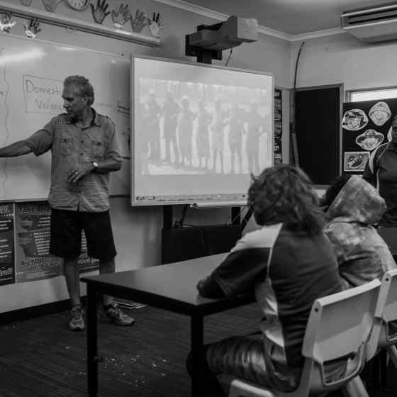 Charlie speaks to children at the school about family violence and how they can help break the cycle of violence. Photo Credit: NT Police