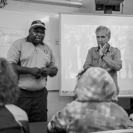 Aboriginal Liaison Officer, Billy Williams translates Charlie's message in language to the Maningrida College students. Photo Credit: NT Police