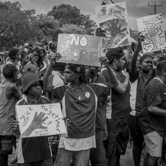 A community march took place through the street of Maningrida with people chanting 'NO MORE family violence'. Photo Credit: NT Police