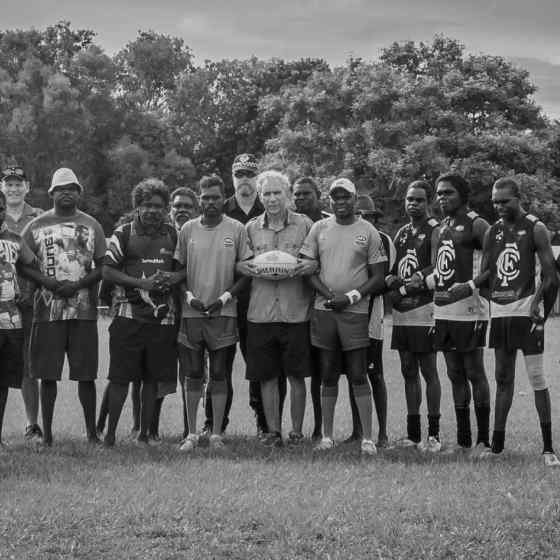 Community members, footy players and umpires alike all link up to say NO MORE to family violence. Photo Credit: NT Police