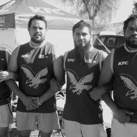 Pioneer FC leadership group link arms in support of the NO MORE Campaign. From L to R: Luke Adams, Eric Campbell, Paul Campbell, Eric Williams.