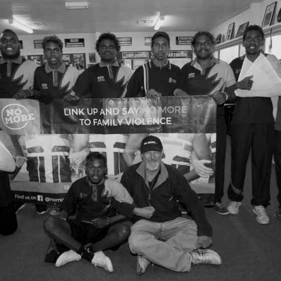 Yirara College Clontarf boys link up after an education session about family violence.