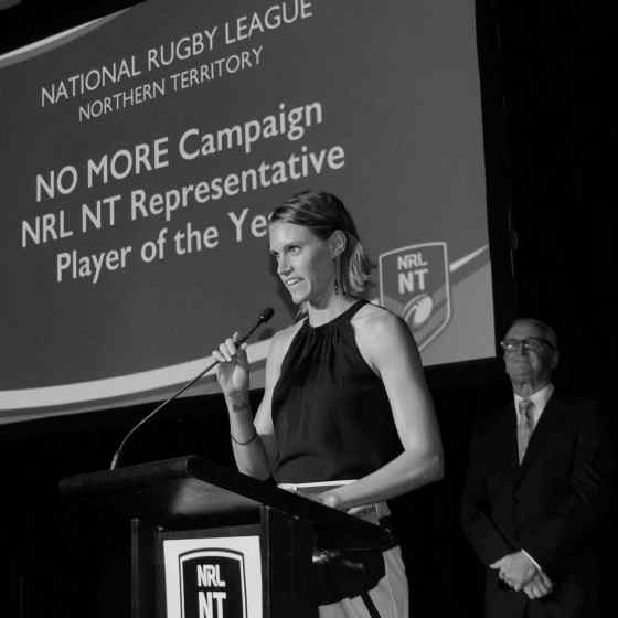 NO MORE Campaign worker Alex Billeter presents the very first NO MORE Campaign Player of the Year Award at the NRL NT Frank Johnson Medal night. 